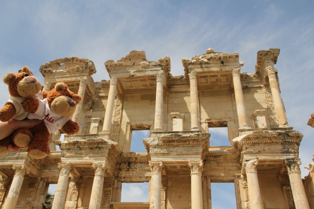 Bearaptu flying high near the Library at the ruins of Ephesus .